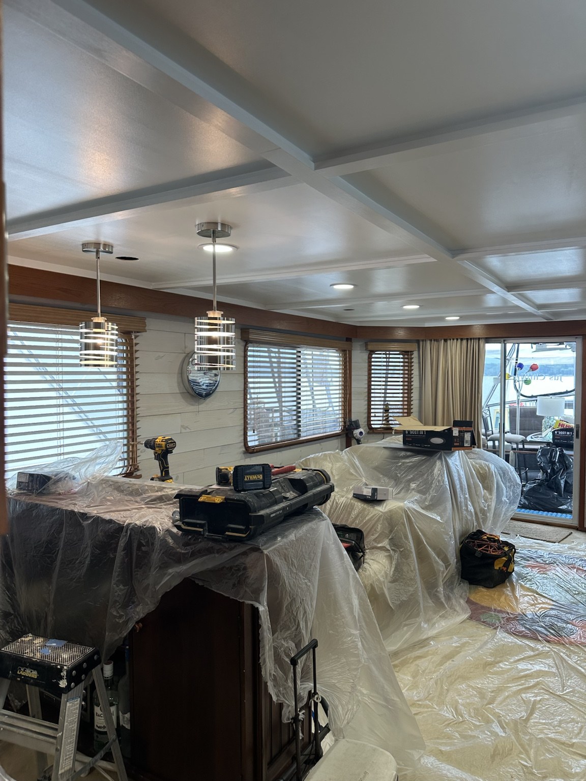 Finished marine coffered ceiling with completed trim and lighting