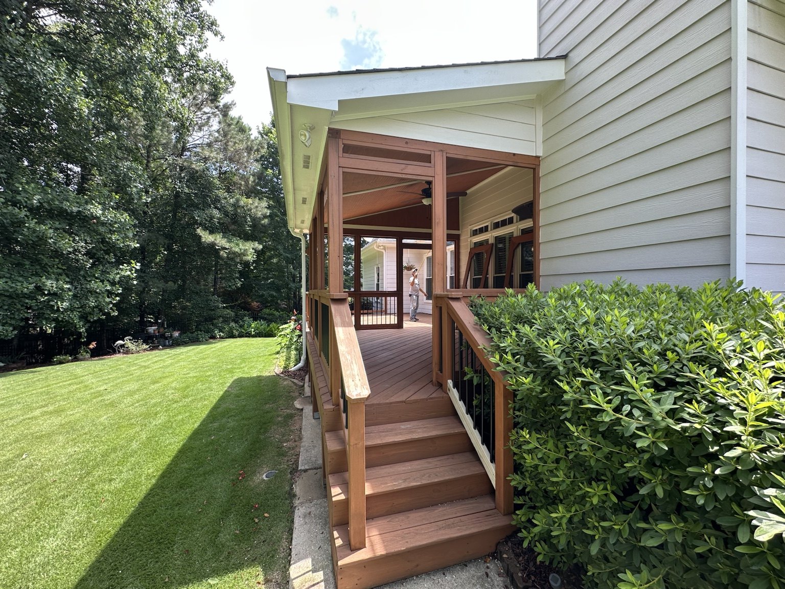 Deck and screened porch before renovation — view 1