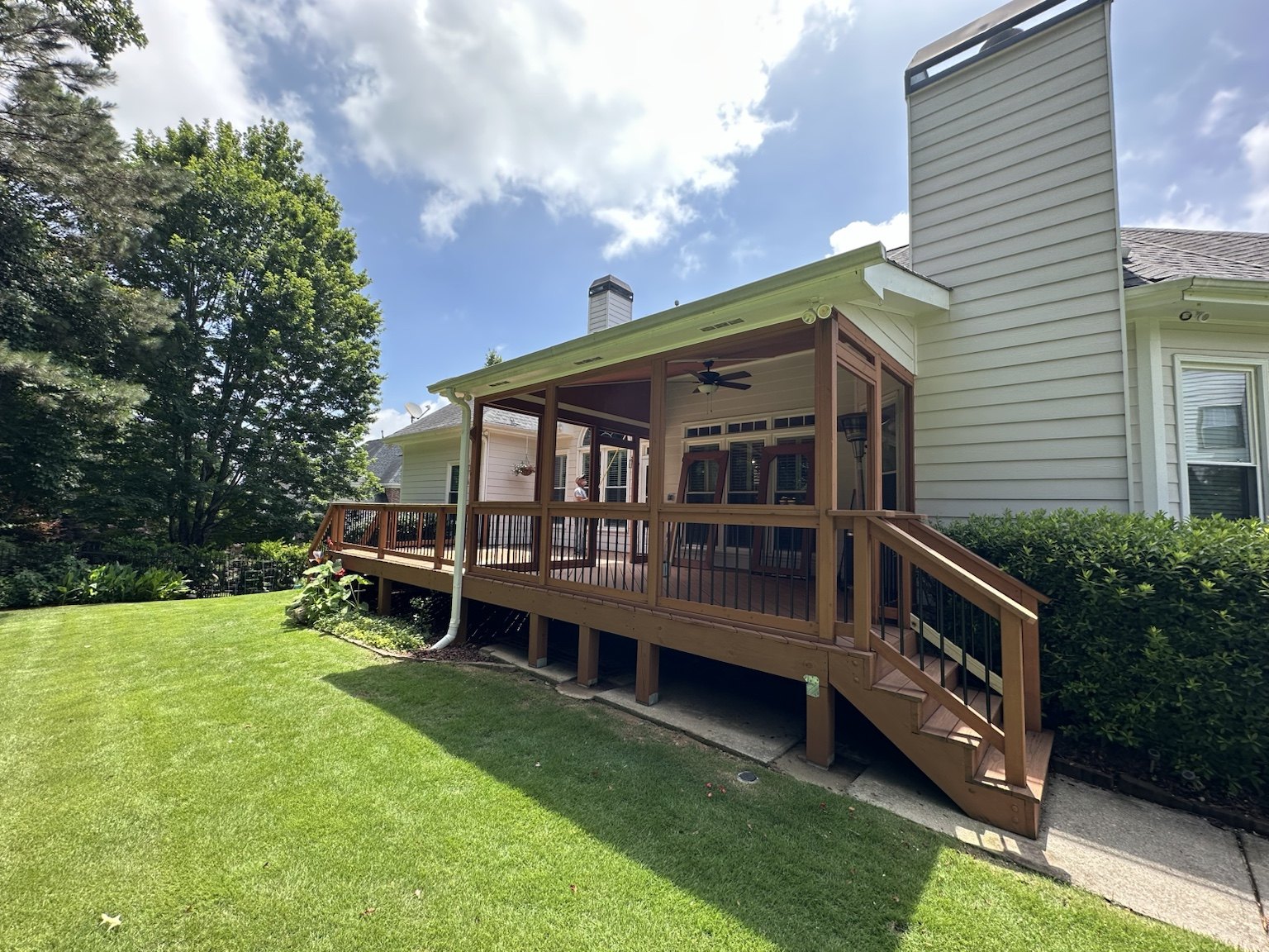 Deck and screened porch before renovation — view 2